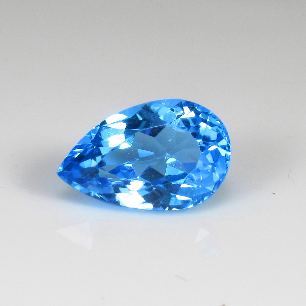 2.58 Ct Natural Blue Topaz Pear Cut: Weight - 2.58 Ct / Size - 10.80 x 6.90 x 5.90 mm / Shape - Pear Cut / Color - Blue / Clarity - VVS / Origin - Brazil / Treatment - Irradiated