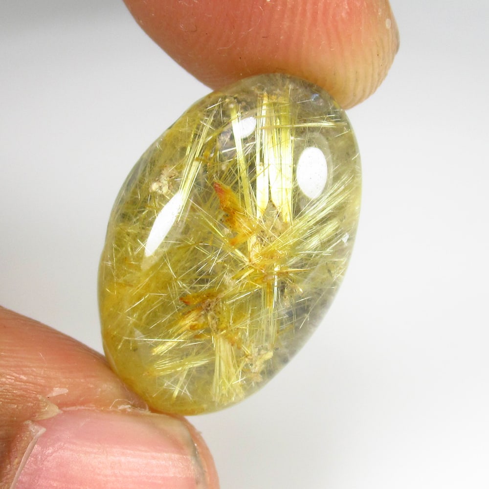 11.46 Ct Natural Golden Rutile Quartz Oval Cab: Weight - 11.46 Ct / Size - 19.20 x 13.00 x 5.80 mm / Shape - Oval Cab / Clarity - Transparent / Origin - Norway / Treatment - None