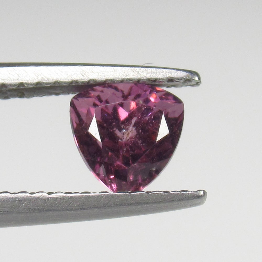0.93 Ct Natural Pink Spinel Trillion Cut: Weight - 0.93 Ct / Size -5.40 x 5.40 x 4.20 mm / Shape - Trillion Cut / Color - Pink / Clarity - SI / Origin - Mozambique / Treatment - None