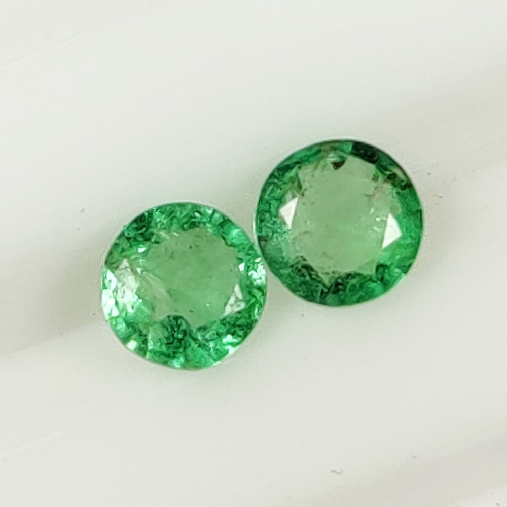 0.63 Ct Natural Zambian Emerald Round Cut Pair (1 of 2)