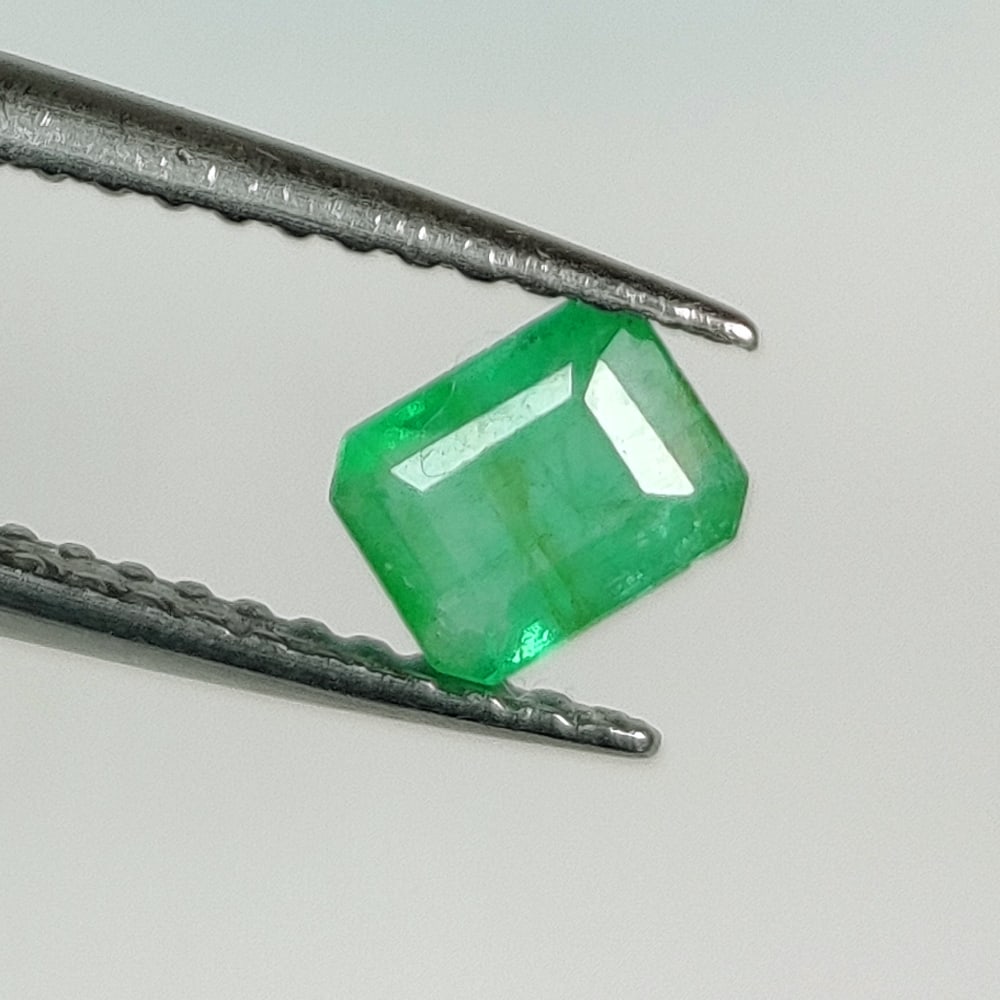 0.44 Ct Natural Zambian Emerald Octagon Cut: Weight - 0.44 Ct / Dimensions - 5.10 x 4.00 x 3.60 mm / Shape - Octagon Cut / Color - Green / Clarity - SI / Origin - Zambia / Treatment - Natural Emeralds are commonly enhanced by oil