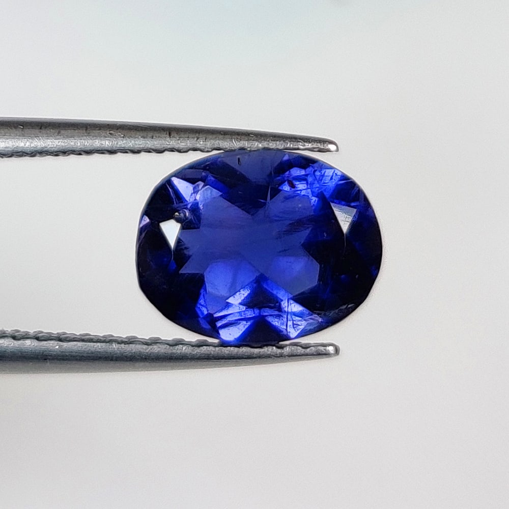 1.72 Ct Natural Deep Violet Iolite Oval Cut: Weight - 1.72 Ct / Dimensions - 8.80 x 6.80 x 4.80 mm / Shape - Oval Cut / Color - Deep Violet / Clarity - VVS / Origin - Nigeria / Treatment - None