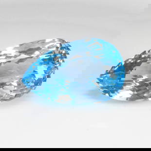 20.92 Ct Natural Swiss Blue Topaz Pear Mixed Cut: Weight - 20.92 Ct / Dimensions - 19.80 x 13.00 x 10.60 mm / Shape & Cut - Pear Cut / Color - Blue / Transparency - VVS / Origin - Brazil / Comments - Irradiated