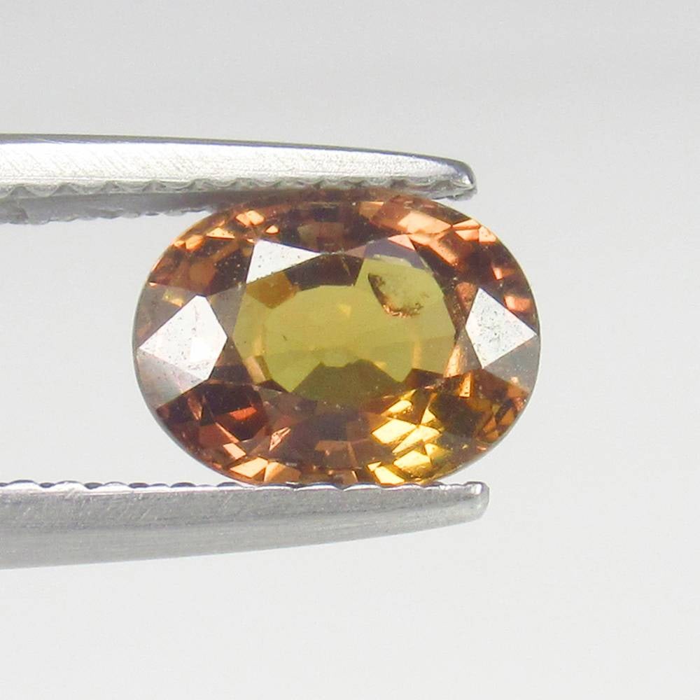 1.72 Ct Natural Brown Sapphire Oval Cut: Weight - 1.72 Ct / Size- 8.00 x 6.00 x 4.00 mm / Shape - Oval Cut / Clarity - SI / Origin - Sri Lanka / Treatment - Standard Heated