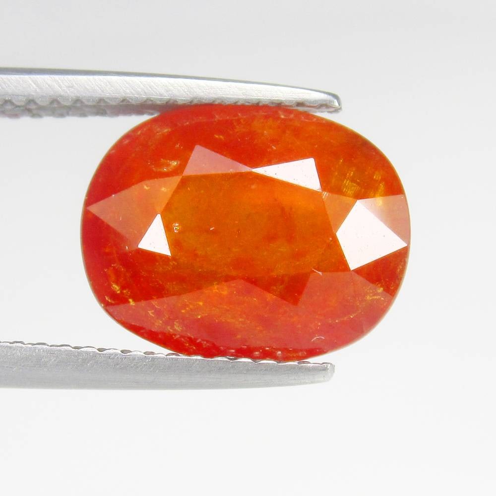 6.47 Ct Natural Deep Orange Spessarite Garnet Oval Cut: Weight - 6.47 Ct / Dimensions - 12.10 x 9.60 x 5.90 mm / Shape - Oval Cut / Clarity - SI / Origin - Madagascar / Treatment - None
