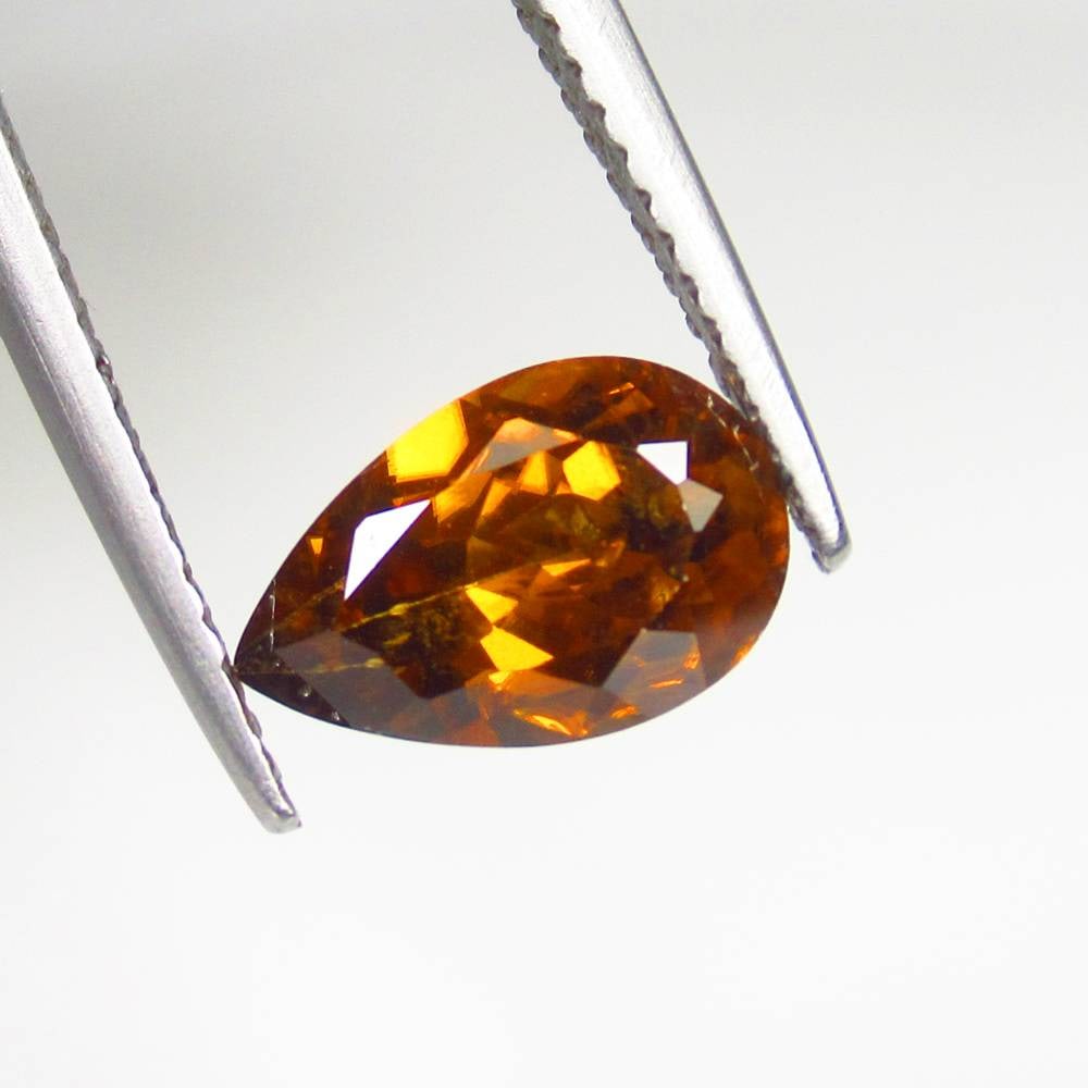 2.50 Ct Natural Brown Zircon Pear Cut: Weight - 2.50 Ct / Size - 9.90 x 6.40 x 4.40 mm / Shape - Pear Cut / Color - Brown / Clarity - VVS / Origin - Cambodia / Treatment - Gentle Heat