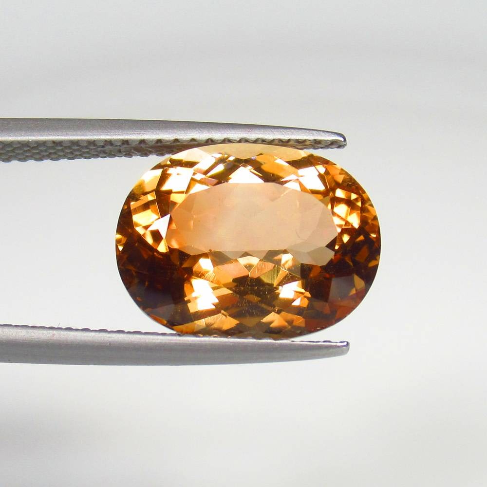 7.45 Ct Natural Champagne Topaz Oval Cut: Weight - 7.45 Ct / Size - 13.40 x 10.20 x 6.70 mm / Top Class Quality / Oval Cut / Origin - Brazil / Treatment - None