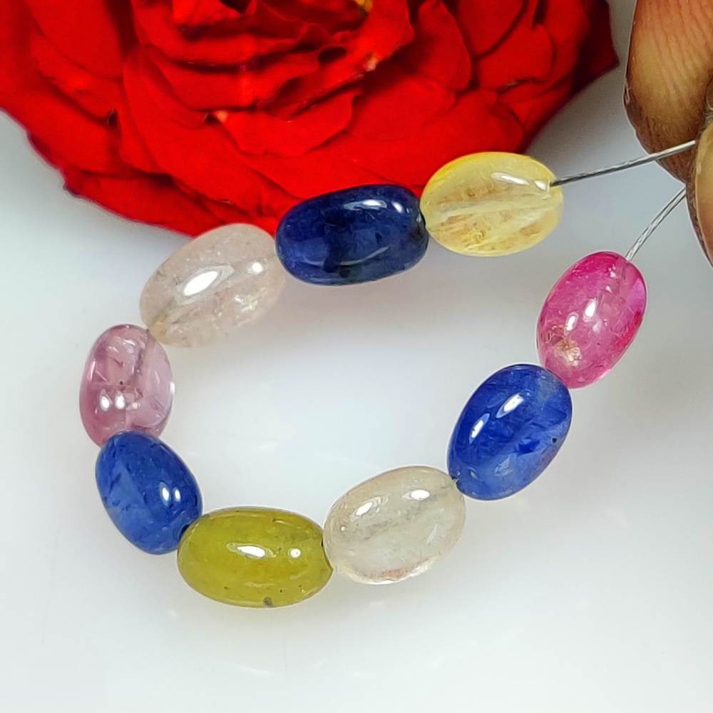 13.41 Ct Natural Multicolor Sapphire 9 Oval Drilled Loose Beads: Weight - 13.41 Ct / Dimensions - 6.80 x 5.10 - 7.60 x 5.20 mm / 9 Pc's / Shape & Cut - Oval Cab Beads / Color - Multicolor / Transparency - Transparent / Comments - Standard Heated