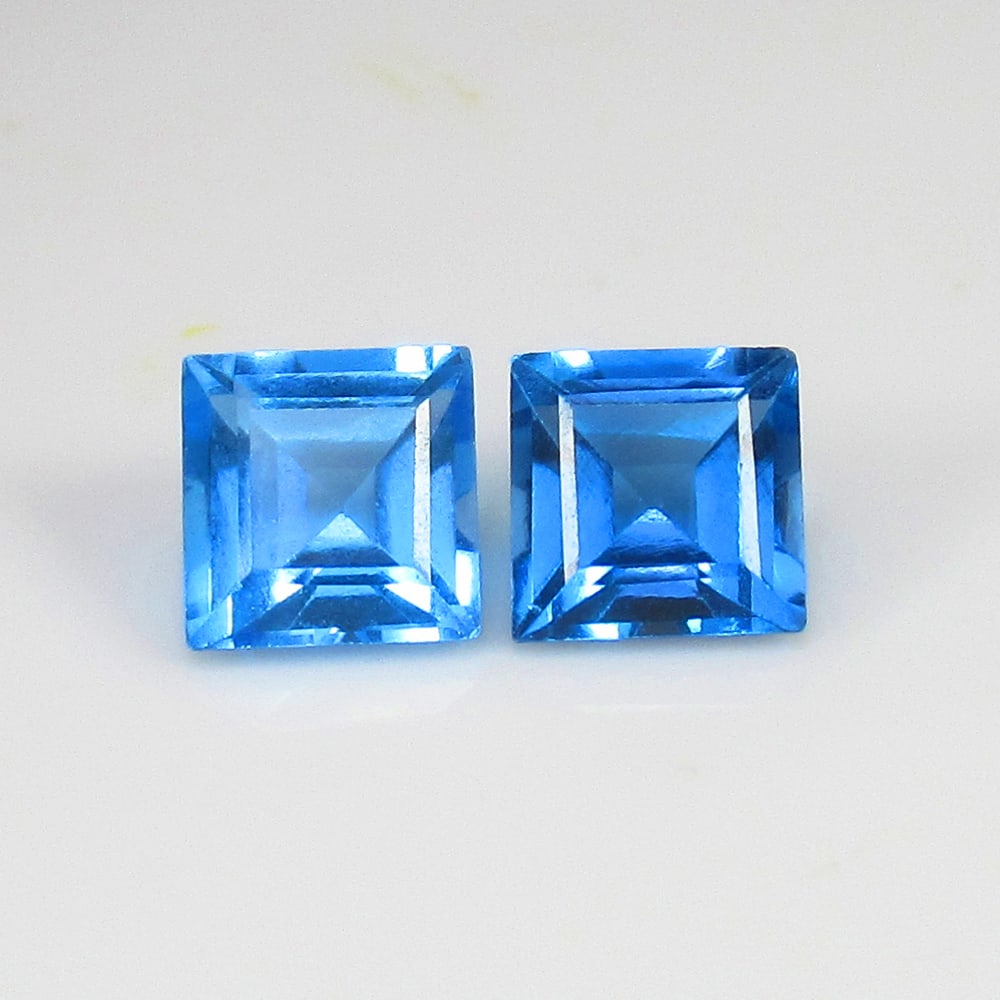 3.92 Ct Natural Blue Topaz Square Cut Pair: Weight - 3.92 Ct / Size - 7.00 x 7.00 x 4.70 mm / 2 Pc's / Shape - Square Cut / Color - Blue / Clarity - VVS / Origin - Brazil / Treatment - Irradiated