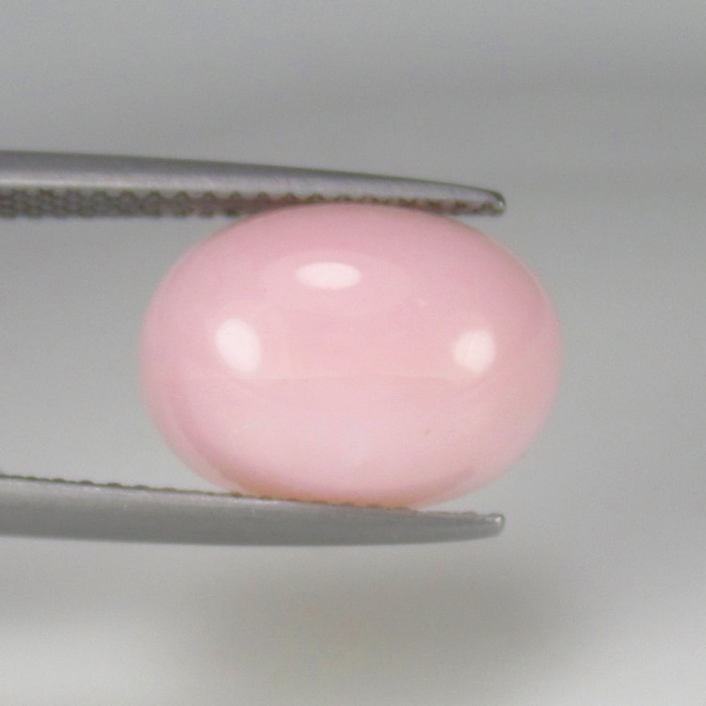 5.09 Ct Natural Pink Opal Oval Cab: Weight - 5.09 Ct / Size - 13.10 x 9.50 x 5.60 mm / Shape - Oval Cabochon / Clarity - Opaque / Origin - Peru / Treatment - None