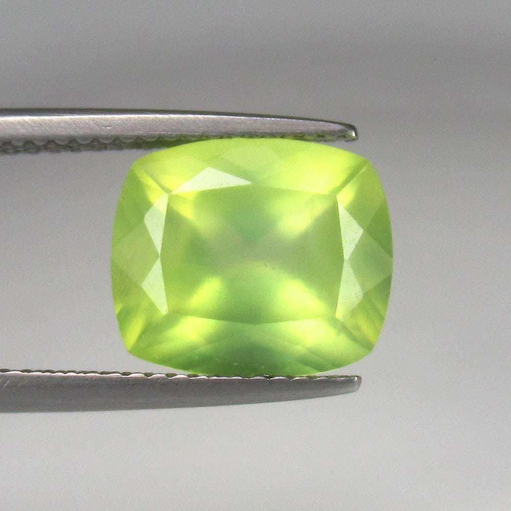 4.62 Ct Natural Prehnite Cushion Cut: Weight - 4.62 Ct / Size - 11.20 x 9.60 x 6.50 mm / Shape - Cushion Cut / Clarity - Semi Transaprent / Origin - Brazil / Treatment - None