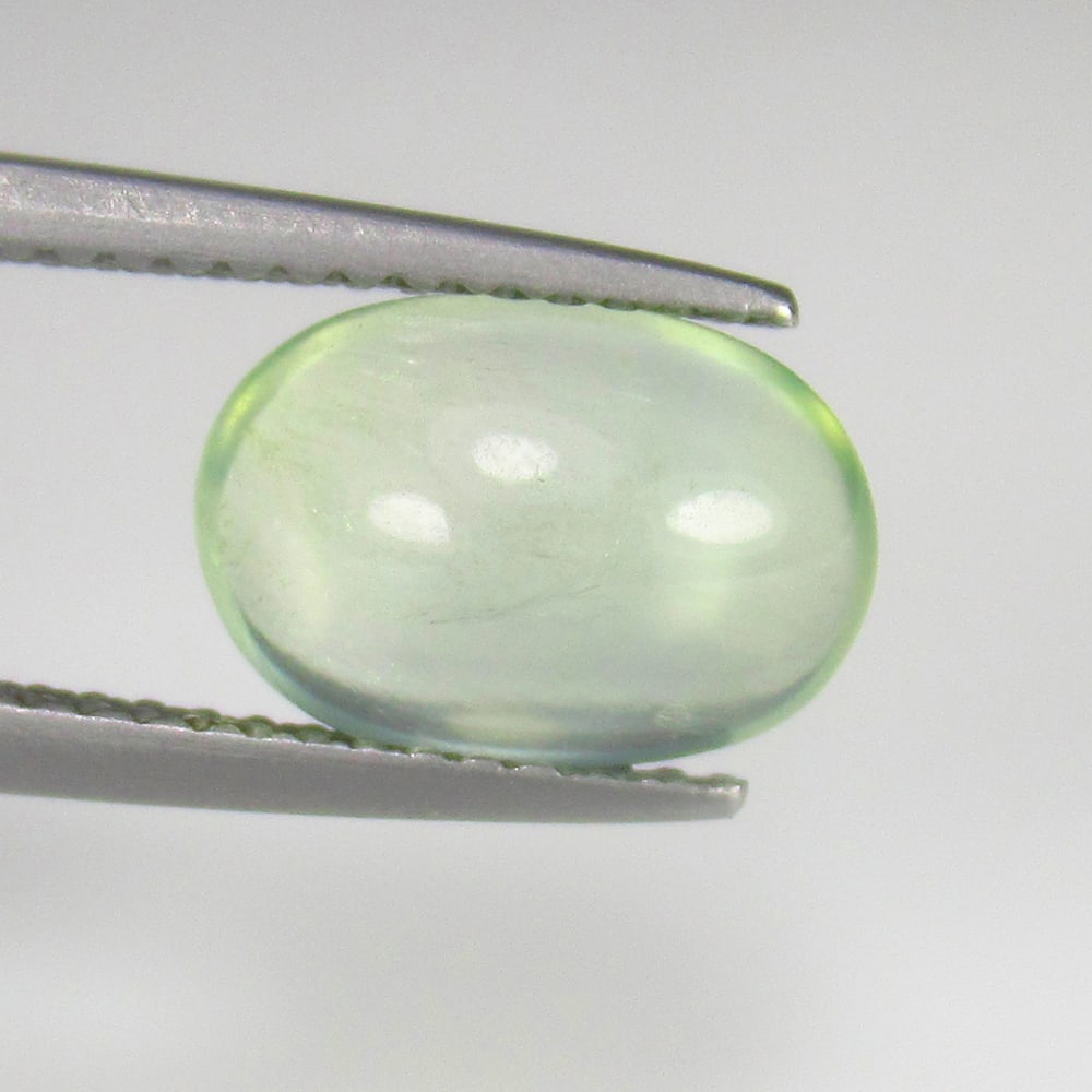2.16 Ct Natural Fine Green Prehnite Oval Cab: Weight - 2.16 Ct / Dimensions - 10.40 x 7.20 x 4.00 mm / Shape - Oval Cab / Clarity - Semi Transaprent / Origin - Brazil / Treatment - None