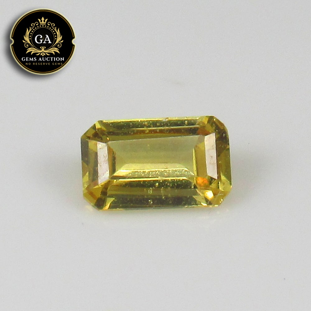 0.32 Ct Natural Ceylon Yellow Sapphire Octagon Cut: Weight - 0.32 Ct / Size- 5.00 x 3.10 x 2.00 mm / Shape - Octagon Cut / Clarity - SI / Origin - Sri Lanka / Treatment - Standard Heated