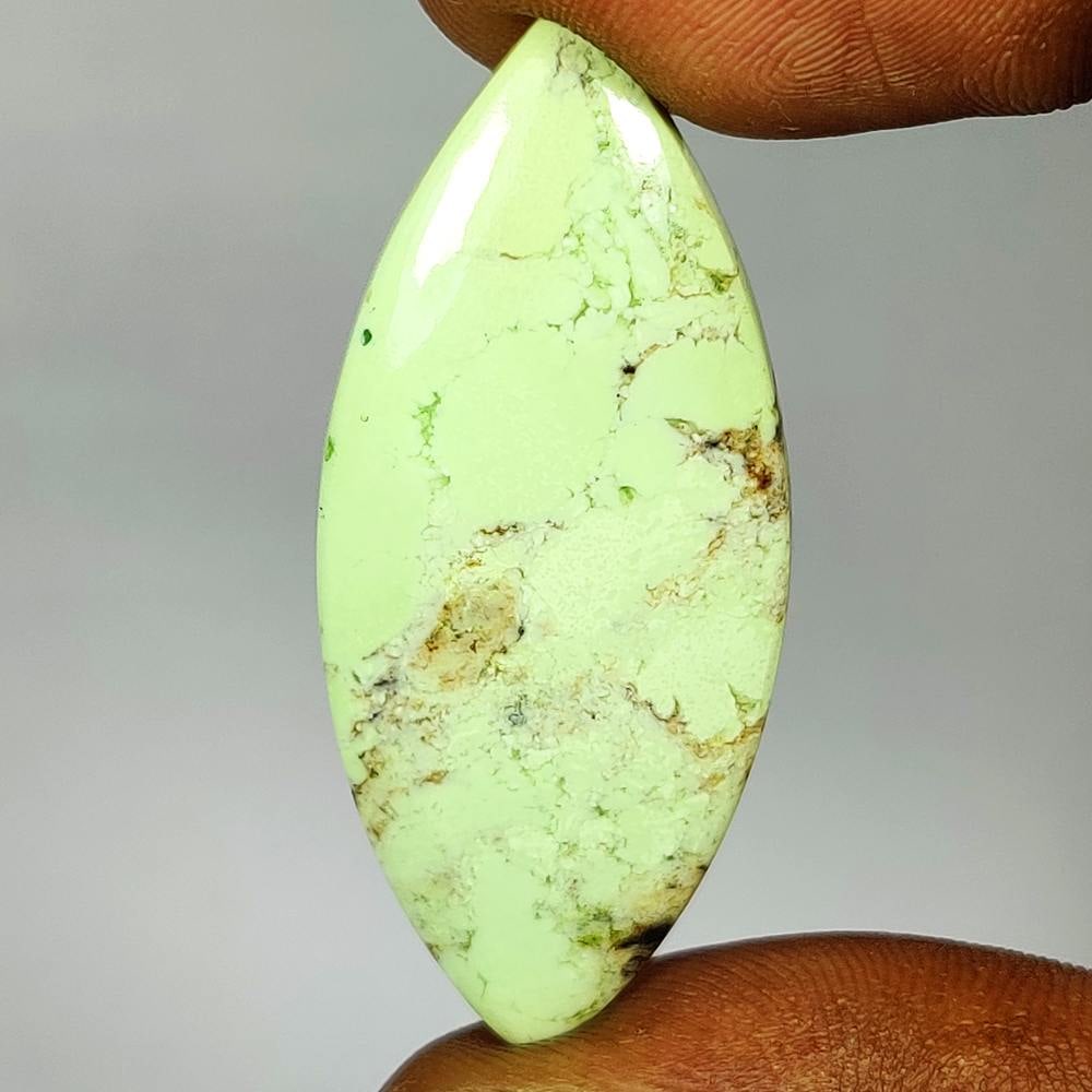 29.39 Ct Natural Lemon Chrysoprase Marquise Cab: Weight - 29.39 Ct / Dimensions - 43.00 x 17.70 x 5.00 mm / Shape - Marquise Cab / Transparency - Semi-Transparent / Origin - Brazil / Treatment - None