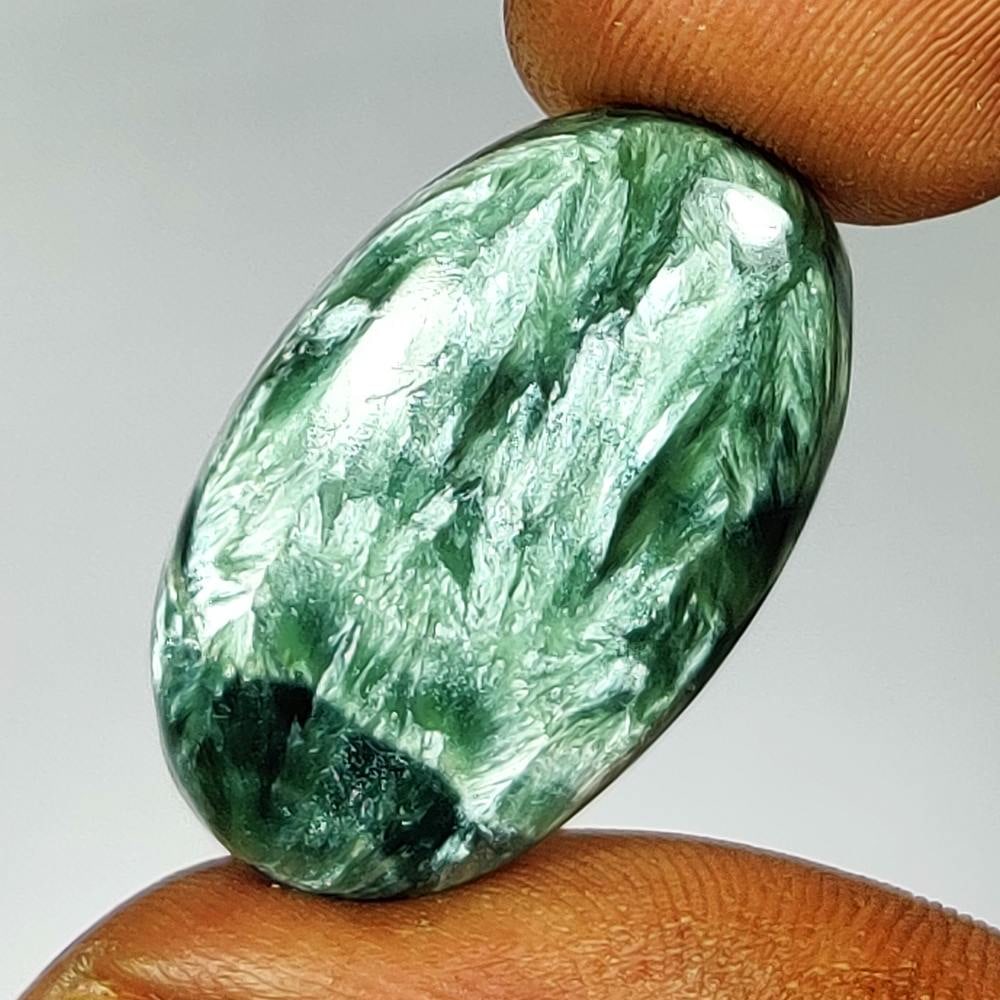 20.19 Ct Natural Serphinite Oval Cab (1 of 2)