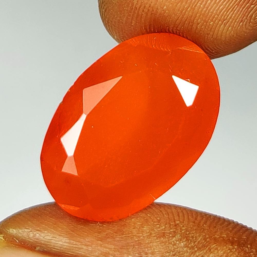 12.01 Ct Natural Orange Carnelian Oval Cut: Weight - 12.01 Ct / Dimensions - 20.40 x 14.10 x 7.40 mm / Shape & Cut - Oval Cut / Transparency - Semi - Transparent / Origin - Brazil
