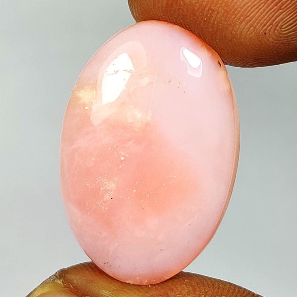 16.75 Ct Natural Pink Opal Oval Cab: Weight - 16.75 Ct / Dimensions - 27.50 x 17.20 x 5.80 mm / Shape - Oval Cabochon / Transparency - Semi - Transparent / Origin - Peru / Treatment - None