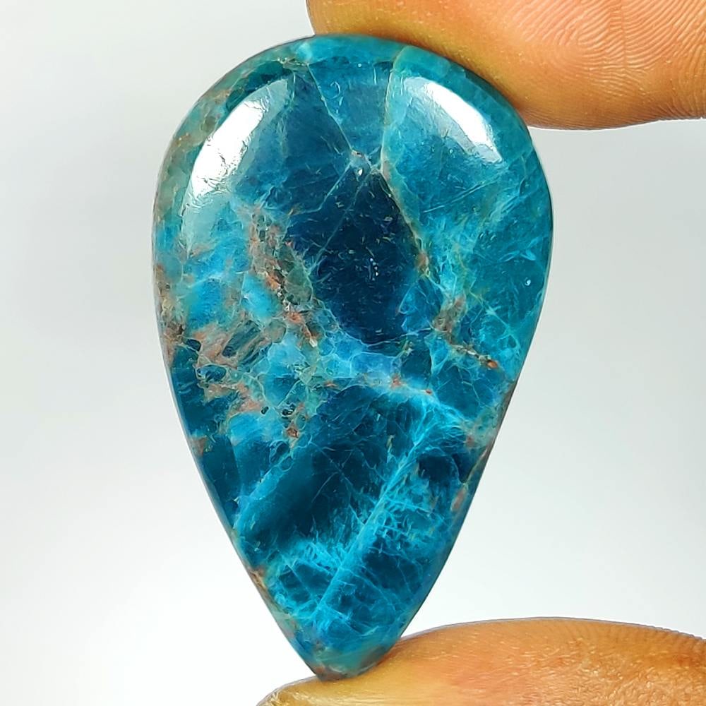 47.36 Ct Natural Peruvian Chrysocolla Pear Cab: Weight - 47.36 Ct / Dimensions - 39.50 x 24.00 x 6.20 mm / Shape - Pear Cab / Transparency - Semi-Transparent / Origin - Congo / Treatment - None