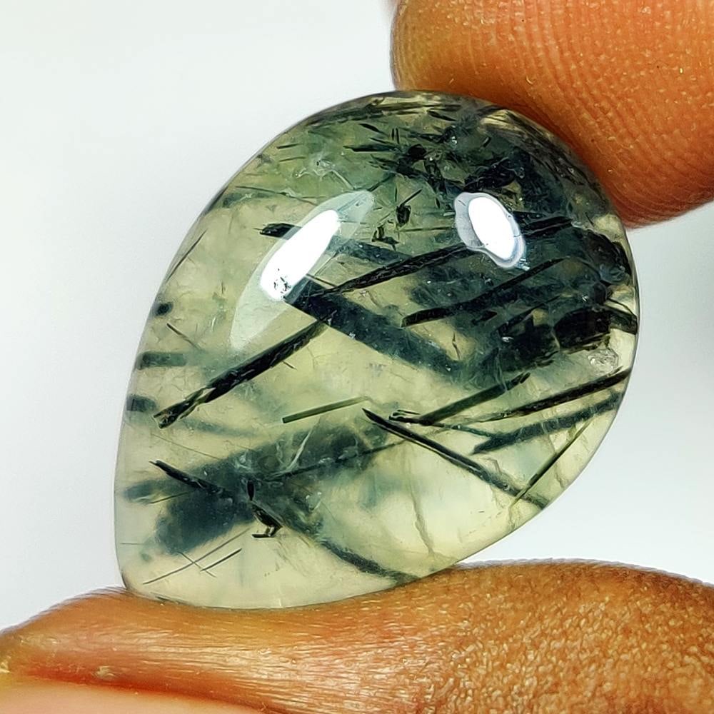 20.60 Ct Natural Green Rutiled Prehnite Pear Cab: Weight - 20.60 Ct / Dimensions - 24.00 x 16.30 x 6.70 mm / Shape - Pear Cab / Transparency - Semi Transparent / Origin - Brazil / Treatment - None