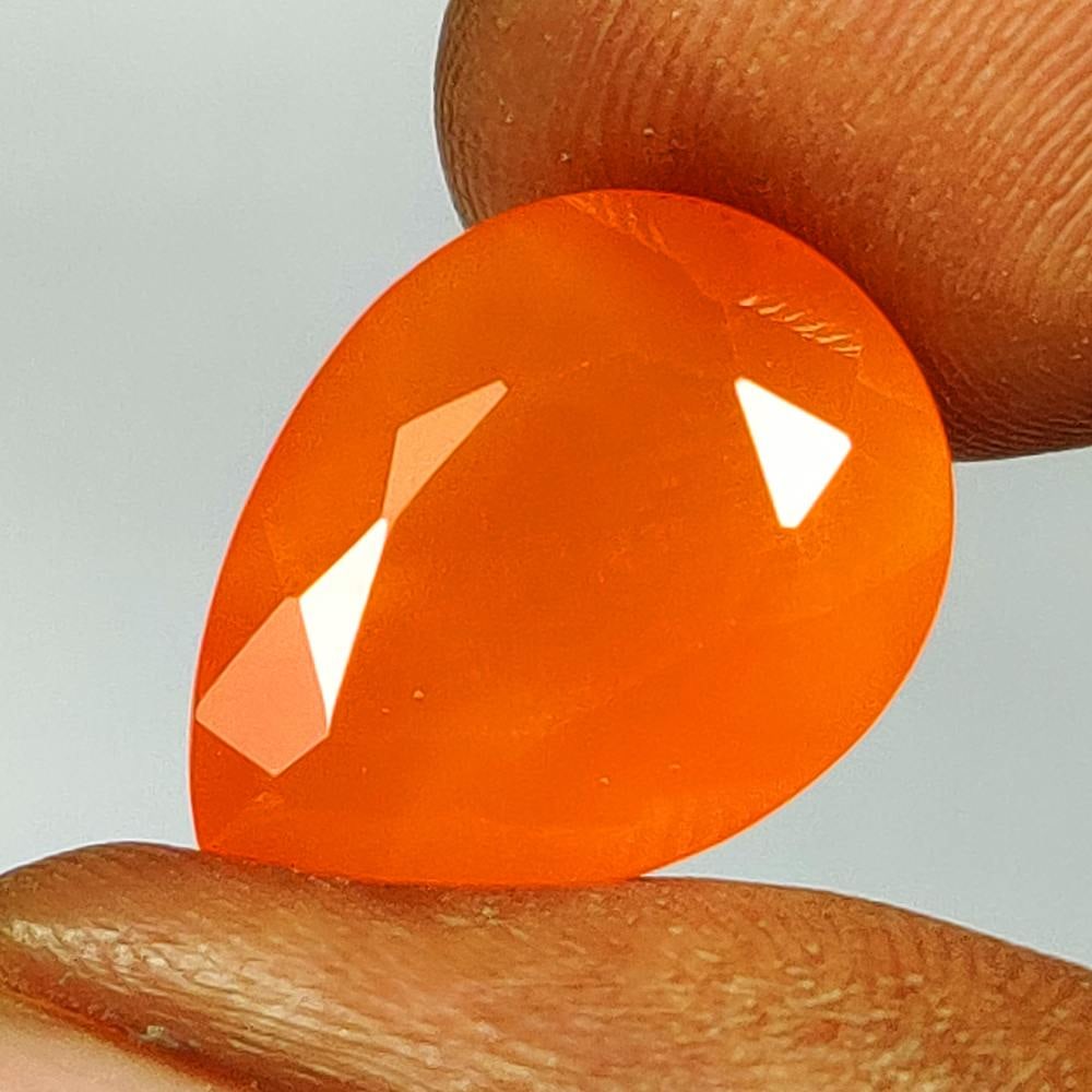 6.98 Ct Natural Orange Carnelian Pear Cut: Weight - 6.98 Ct / Dimensions - 16.20 x 12.20 x 6.80 mm / Shape & Cut - Pear Cut / Transparency - Semi - Transparent / Origin - Brazil