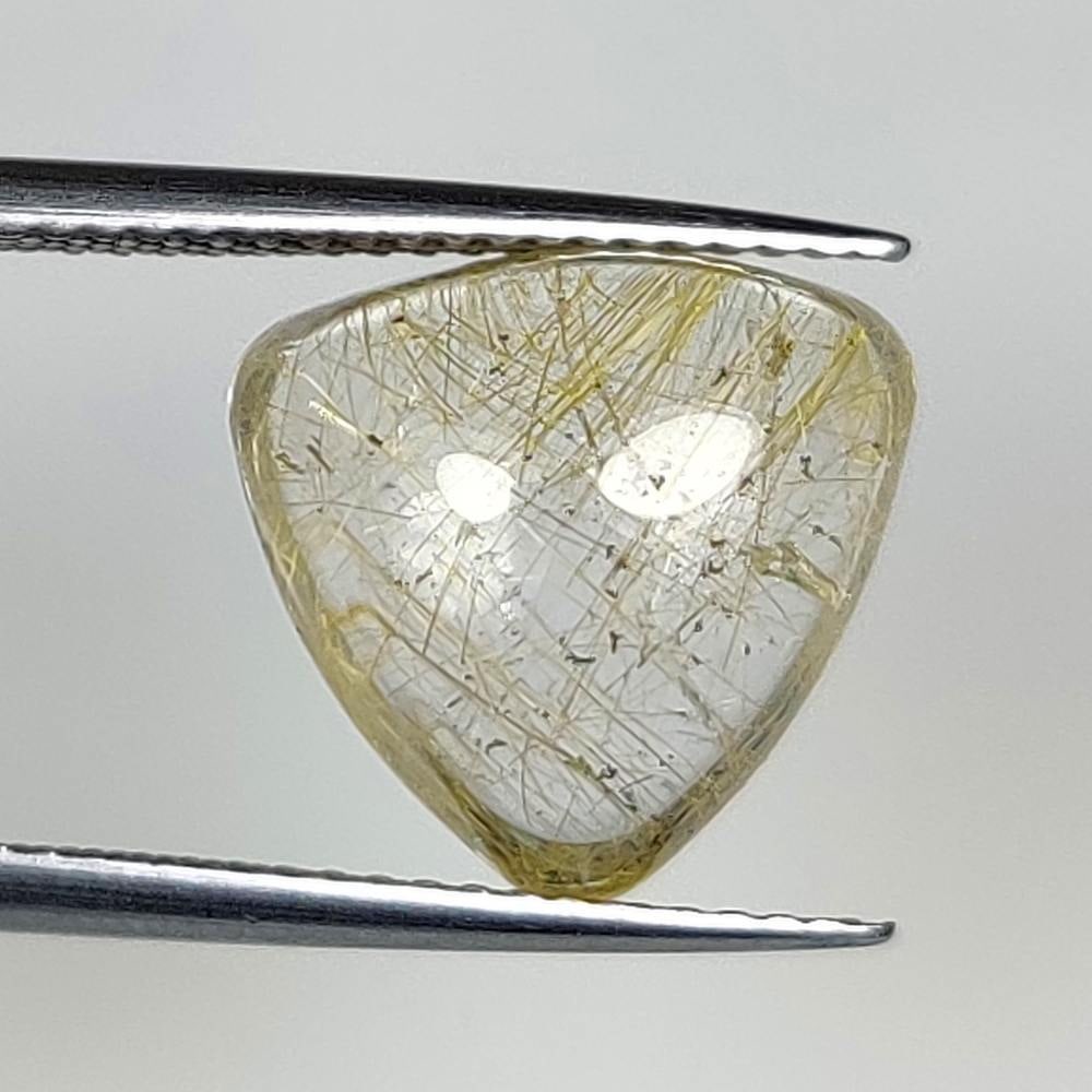 6.37 Ct Natural Golden Line Rutile Quartz Trillion Cab: Weight - 6.37 Ct / Dimensions - 12.10 x 12.00 x 6.80 mm / Shape - Trillion Cab / Transparency - Transparent / Origin - Norway / Treatment - None