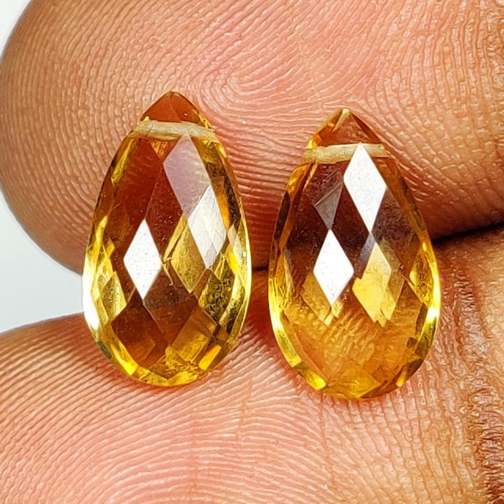 4.40 Ct Natural Citrine Drilled Pear Faceted Drilled Beads - 2 Pc's: Weight - 4.40 Ct / Dimensions - 12.40 x 7.20 x 3.90 mm / 2 Pc's / Shape - Drilled Pear Beads / Color - Yellow / Origin -Brazil / Treatment - Heated