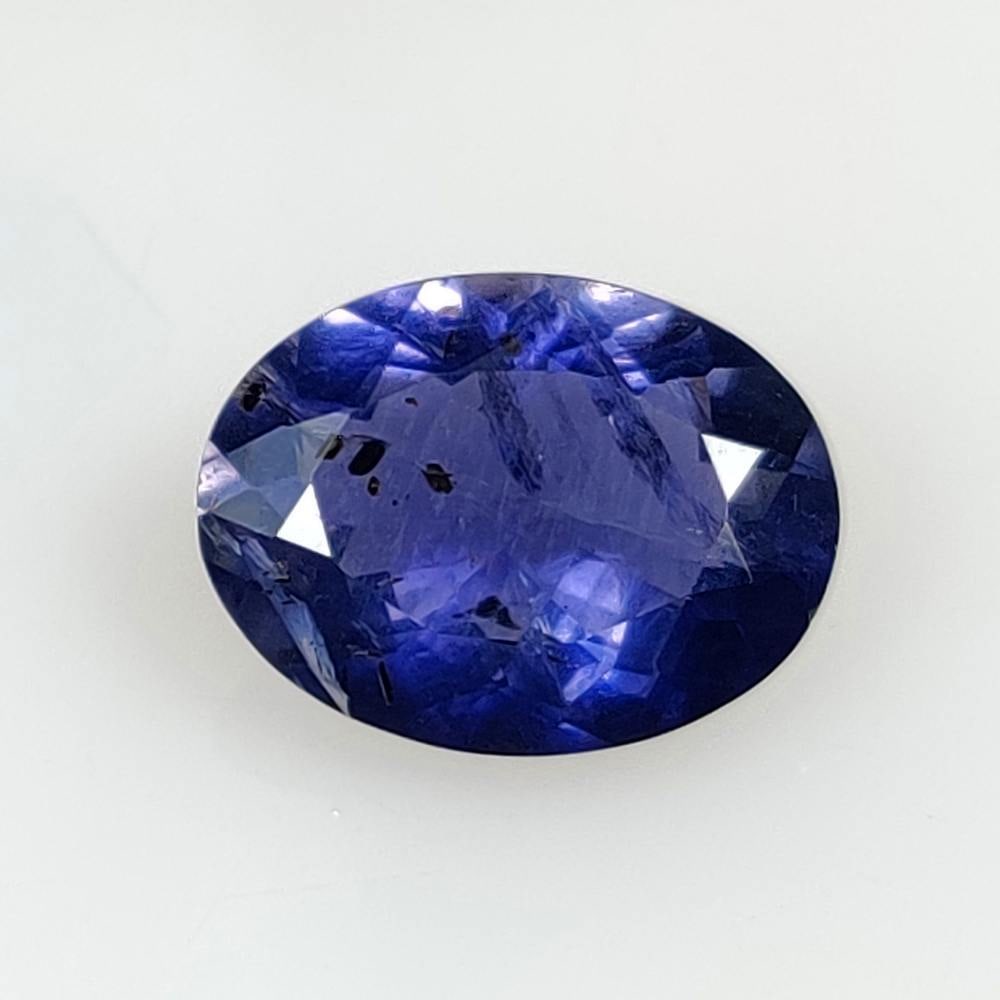 3.44 Ct Natural Deep Violet Iolite Oval Cut: Weight - 3.44 Ct / Dimensions - 12.80 x 9.70 x 5.20 mm / Shape - Oval Cut / Color - Deep Violet / Clarity - VVS / Origin - Nigeria / Treatment - None