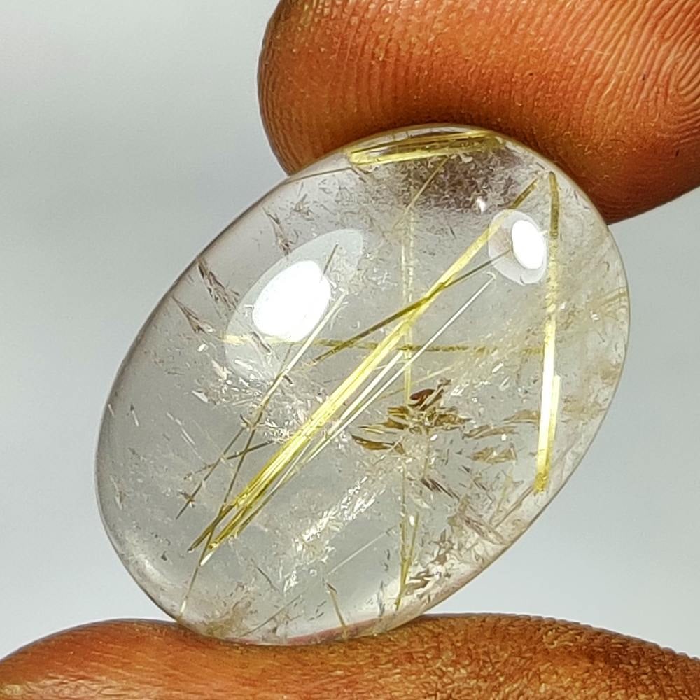 19.93 Ct Natural Golden Line Rutile Quartz Oval Cab: Weight - 19.93 Ct / Dimensions - 24.00 x 16.00 x 6.90 mm / Shape - Oval Cab / Transparency - Transparent / Origin - Norway / Treatment - None