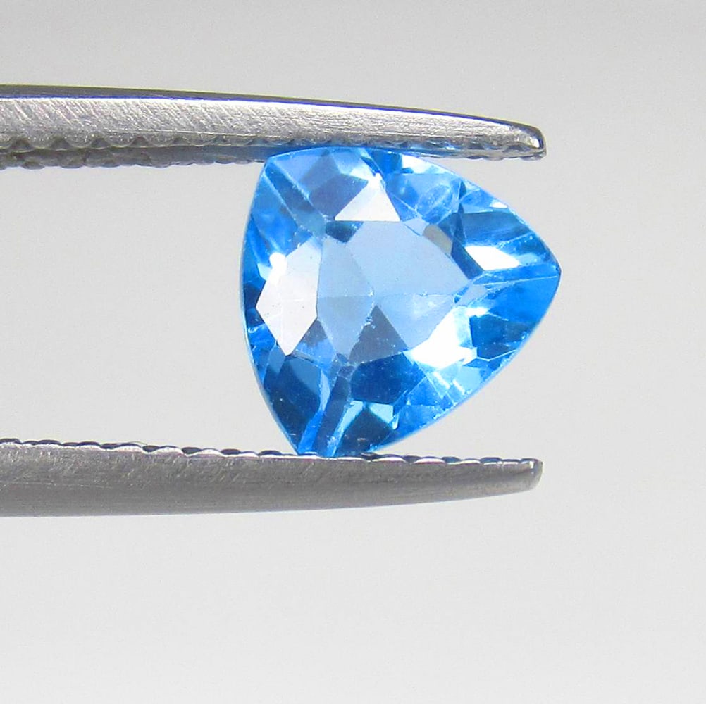 1.41 Ct Natural Blue Topaz Trillion Cut: Weight - 1.41 Ct / Dimensions - 7.30 x 7.10 x 4.30 mm / Shape & Cut - Trillion Cut / Color - Blue / Transparency - VVS / Origin - Brazil / Comments - Irradiated