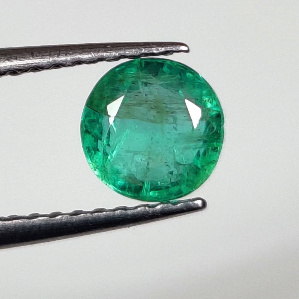 0.74 Ct Natural Zambian Emerald Round Cut (1 of 2)