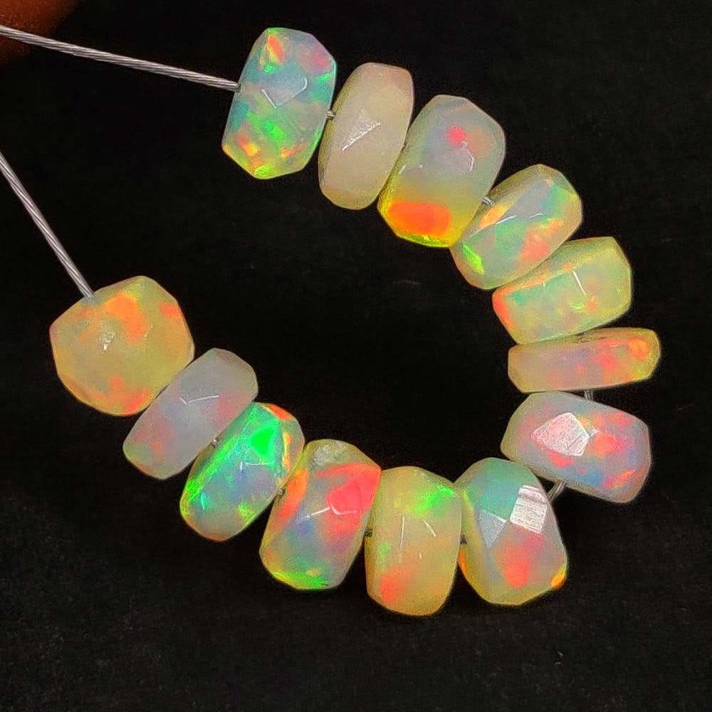 4.59 Ct Natural Multicolor Welo Opal Flash Fire Round Cut beads: Weight - 4.59 Ct / Size - 4.70 - 5.10 mm / 13 Pc's / Shape - Round beads / Color - Multicolor / Clarity - Translucent / Origin - Ethiopia / Treatment - None