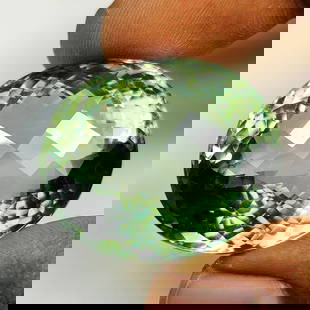 82.50 Ct Natural Green Amethyst "Showpiece"Oval Checkerboard Cut: Weight - 82.50 Ct / Dimensions - 30.00 x 25.00 x 18.80 mm / Shape - Oval Checkerboard Cut / Color - Green / Clarity - VVS / Origin - Brazil / Treatment - None
