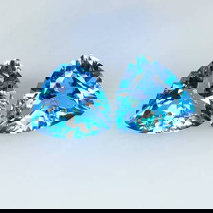 9.60 Ct Natural Blue Topaz Trillion Cut Pair: Weight - 9.60 Ct / Dimensions - 11.00 x 10.90 x 6.50 mm / 2 Pc's / Shape - Trillion Cut / Color - Blue / Clarity - VVS / Origin - Brazil / Treatment - Irradiated