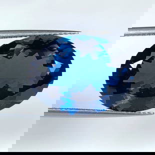 16.18 Ct Natural London Blue Topaz Oval Cut: Weight - 16.18 Ct / Dimensions - 18.60 x 14.00 x 8.00 mm / Shape - Oval Cut / Color - Blue / Clarity - VVS / Origin - Brazil / Treatment - Irradiated