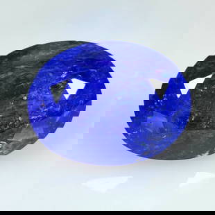 19.96 Ct Natural Tanzanite Oval Cut: Weight : 19.96 Ct / Dimensions : 18.80 x 14.40 x 11.40 mm / Shape : Oval Cut / Color : Purplish Blue / Clarity : Transparent / Treatment : Heated