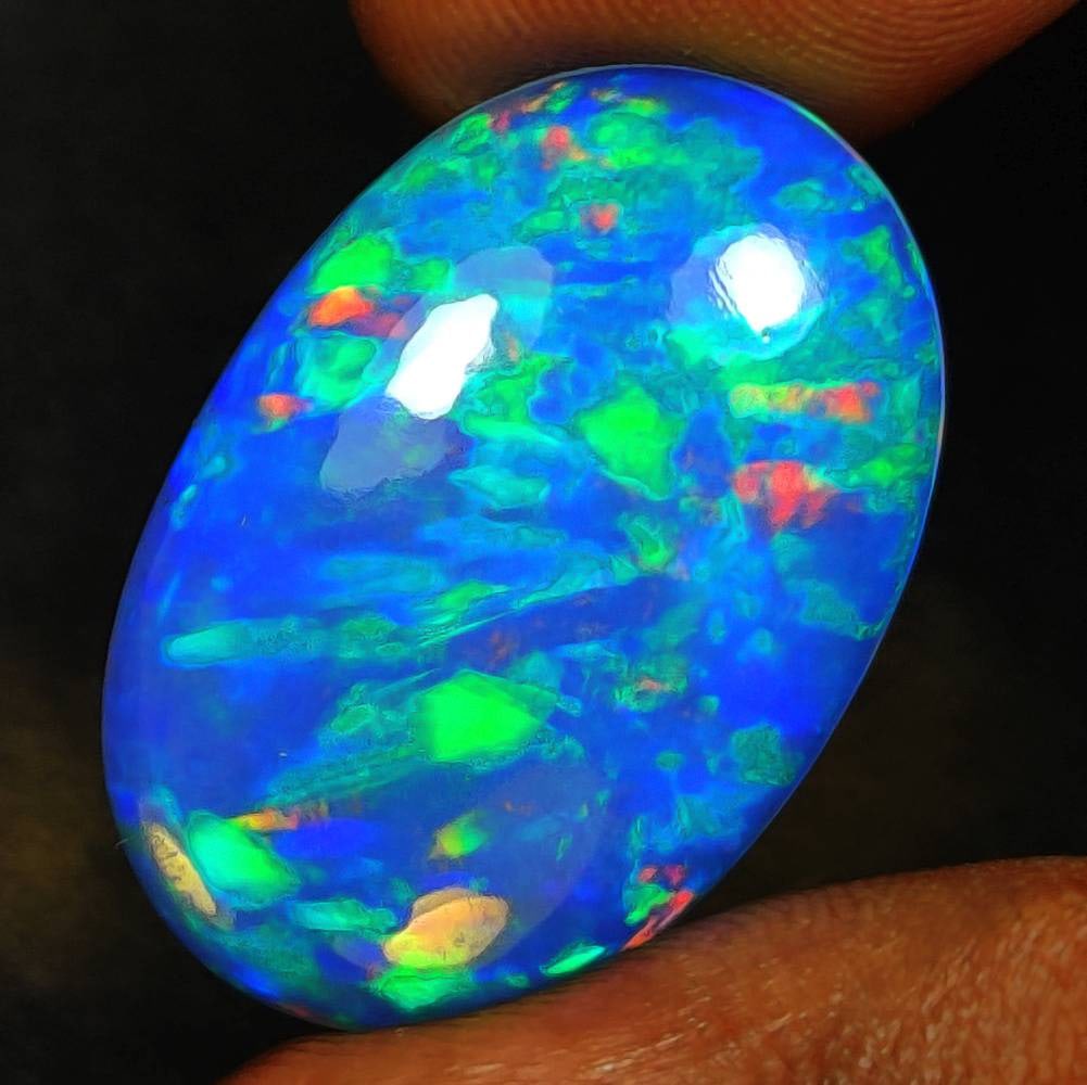 12.91 Ct Natural Multicolor Welo Opal Flash Fire Oval Cab (1 of 3)