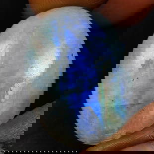 30.94 Ct Natural Blue Tint Moonstone Oval Cab: Weight - 30.94 Ct / Dimensions - 27.00 x 19.30 x 7.60 mm / Shape - Oval Cab / Clarity - Semi-Transparent / Origin - India / Treatment - None