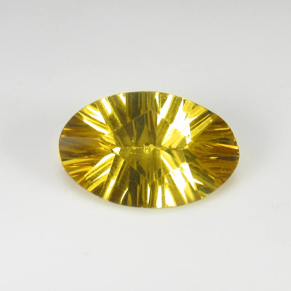 9.14 Ct Natural Yellow Citrine Oval Concave Cut: Weight - 9.14 Ct / Dimensions - 18.60 x 12.00 x 7.80 mm / Shape & Cut - Oval Concave Cut / Color - Yellow / Clarity - VVS / Origin - Brazil / Comments - Heated