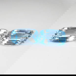 15.50 Ct Natural Blue Topaz Cushion Cut Pair: Weight - 15.50 Ct / Dimensions - 15.20 x 9.20 x 9.20 mm / 2 Pc's / Shape - Cushion Cut / Color - Blue / Clarity - VVS / Origin - Brazil / Treatment - Irradiated