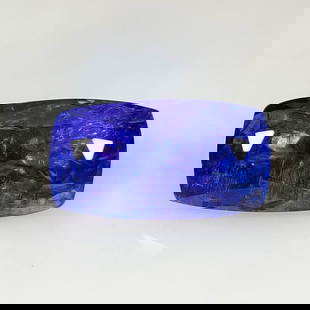 13.74 Ct Natural Tanzanite Cushion Cut: Weight : 13.74 Ct / Dimensions : 18.50 x 10.10 x 9.00 mm / Shape : Cushion Cut / Color : Purplish Blue / Clarity : Transparent / Treatment : Heated