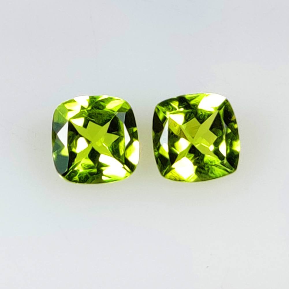 2.77 Ct Natural Green Peridot Cushion Cut Pair: Weight - 2.77 Ct / Dimensions - 7.10 x 7.00 x 3.80 mm / 2 Pc's / Shape - Cushion Cut / Color - Green / Clarity - VVS / Origin - Pakistan / Treatment - None