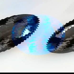 18.94 Ct Natural London Blue Topaz Top Oval Cut: Weight - 18.94 Ct / Dimensions - 18.80 x 14.50 x 9.00 mm / Shape - Oval Cut / Color - Blue / Clarity - VVS / Origin - Brazil / Treatment - Irradiated