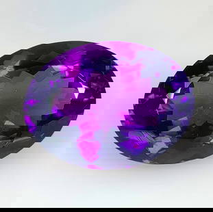 24.58 Ct Natural Purple Amethyst Oval Cut: Weight - 24.58 Ct / Dimensions - 24.00 x 16.90 x 11.40 mm / Shape - Oval Cut / Color - Purple / Clarity - VVS / Origin -Brazil / Treatment - Heated