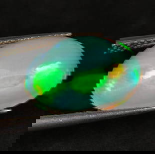 4.20 Ct Natural Multicolor Welo Opal Top Fire Oval Cab: Weight - 4.20 Ct / Dimensions - 15.00 x 10.90 x 5.60 mm / Shape - Oval Cab / Color - Multicolor / Clarity - Translucent / Origin - Ethiopia / Treatment - None