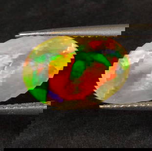 2.23 Ct Natural Multicolor Welo Opal Top Fire Oval Cut: Weight - 2.23 Ct / Dimensions - 12.70 x 8.80 x 4.80 mm / Shape - Oval Cut / Color - Multicolor / Clarity - Translucent / Origin - Ethiopia / Treatment - None