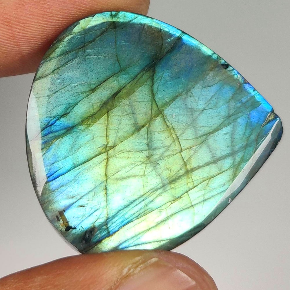 42.68 Ct Natural Labradorite Pear Cab: Weight - 42.68 Ct / Size - 29.00 x 28.00 x 6.80 mm / Shape - Excellent Pear Cab / Clarity - Opaque / Origin - Africa / Treatment - None
