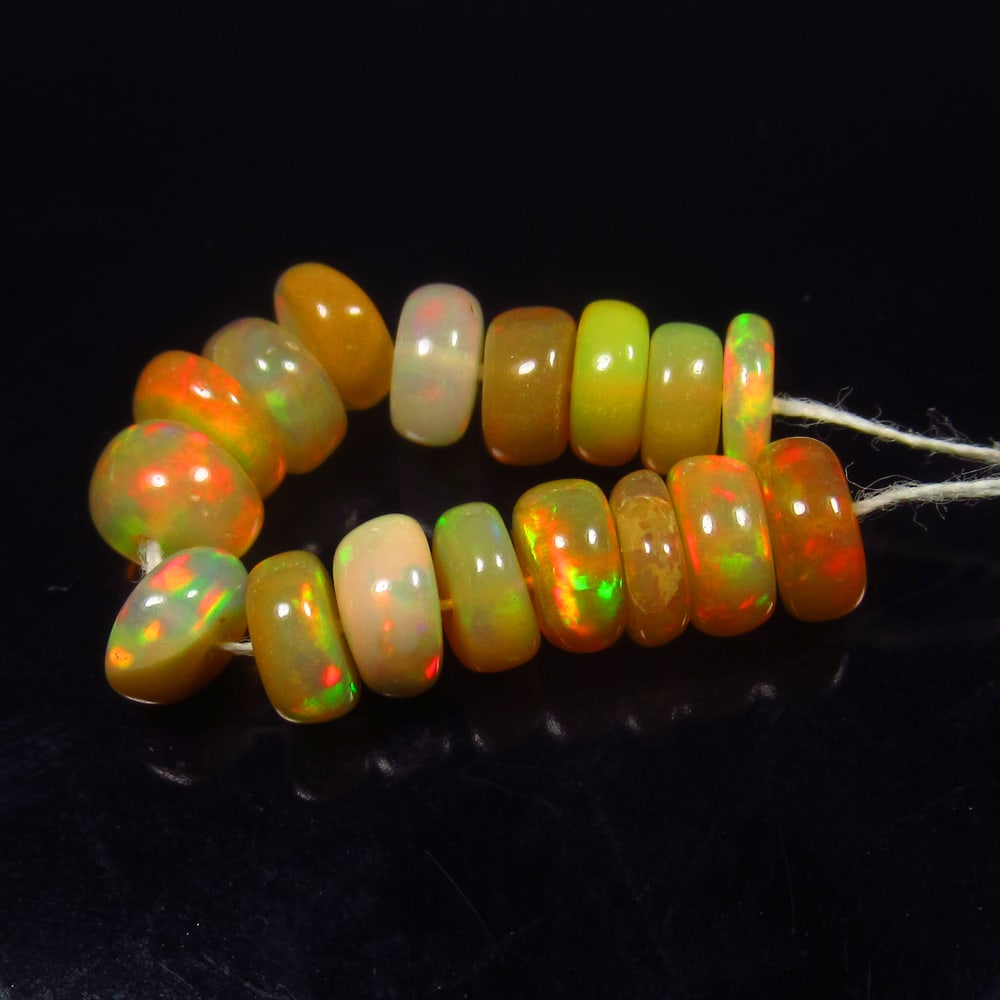 5.34 Ct Natural Multicolor Welo Opal Flash Fire Round Beads: Weight - 5.34 Ct / Dimensions - 4.60 - 5.20 mm / 17 Pc's / Shape & Cut - Drilled Round Beads / Color - Multicolor / Transparency - Translucent / Origin - Ethiopia / Comments - None