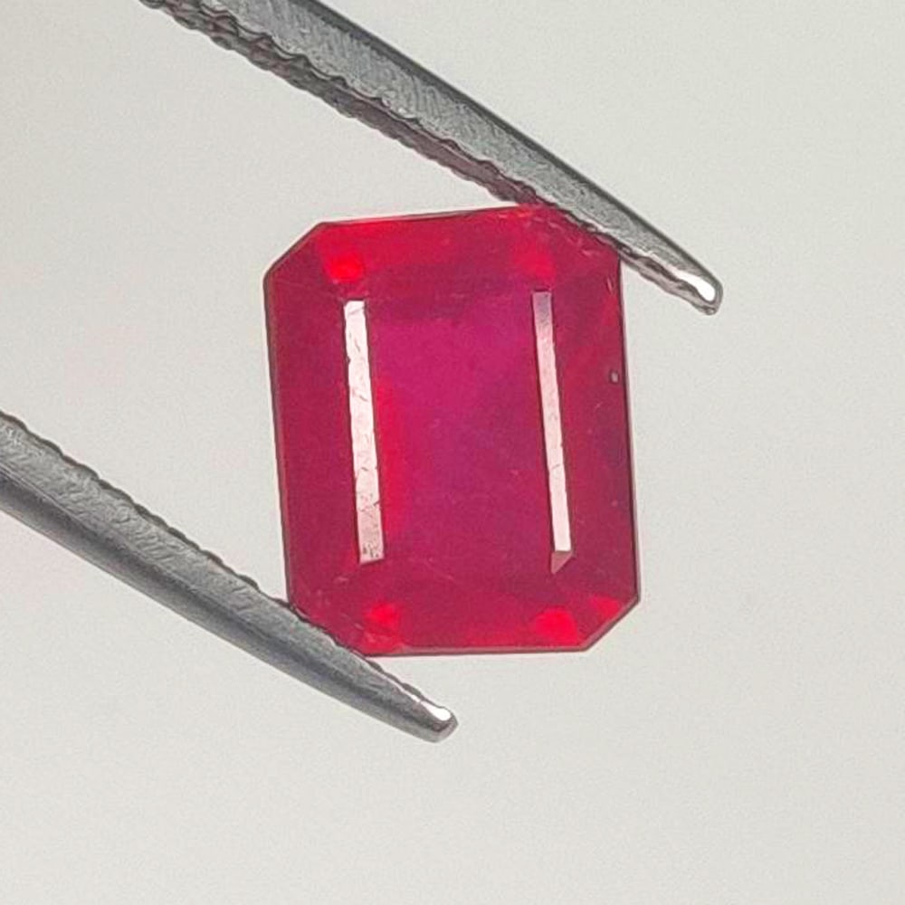 3.96 Ct Natural Pinkish Red Ruby Octagon Cut: Weight - 3.96 Ct / Dimensions - 9.00 x 7.20 x 5.70 mm / Shape - Octagon Cut / Color - Pinkish Red / Clarity - SI / Origin - Mozambique / Treatment - Color Enhanced by Glass Filling