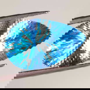 11.23 Ct Natural Swiss Blue Topaz Pear Concave Cut: Weight - 11.23 Ct / Dimensions - 19.00 x 11.90 x 8.00 mm / Shape & Cut - Pear Cut / Color - Blue / Transparency - VVS / Origin - Brazil / Comments - Irradiated