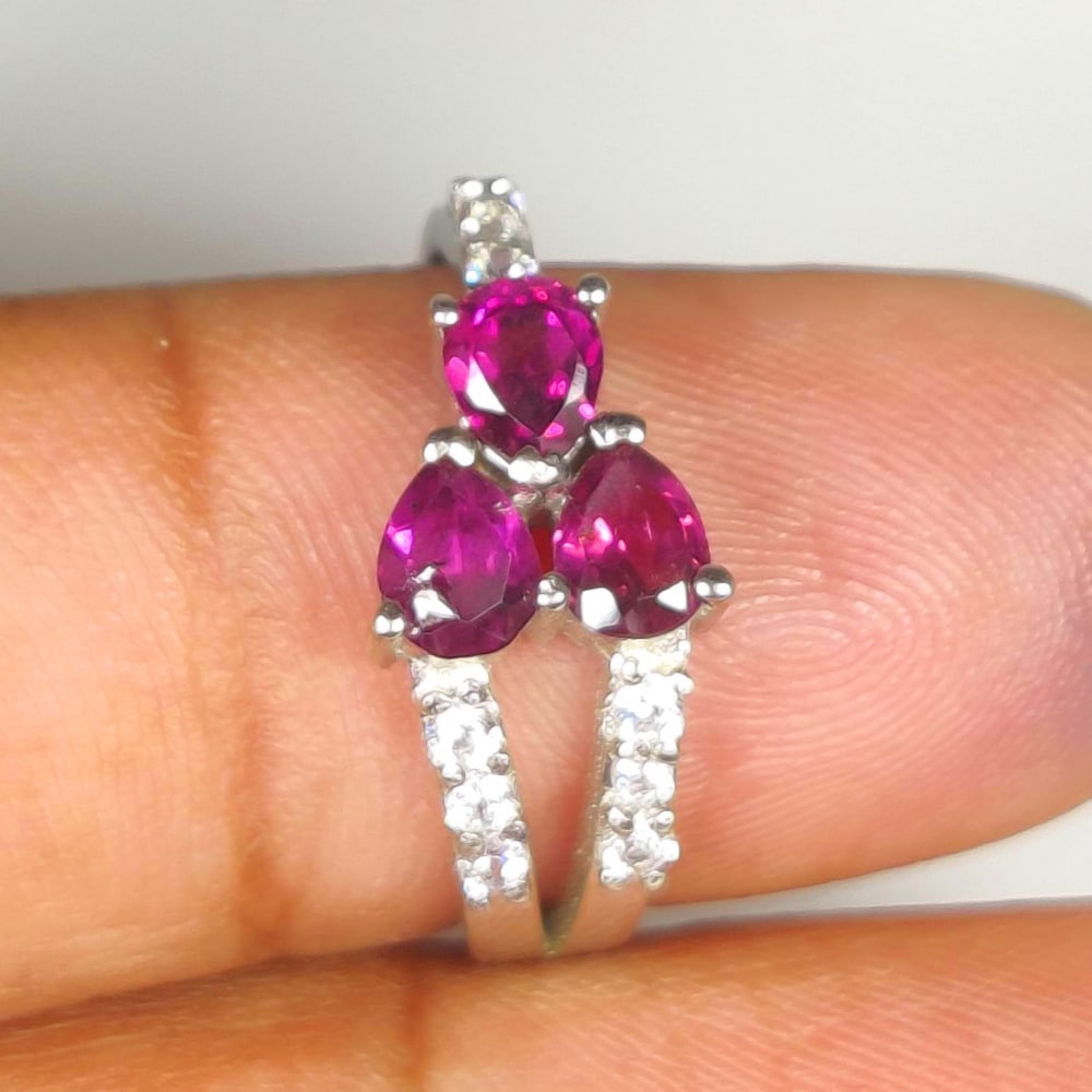 3.04 g 925 Silver Ring With Natural Rhodolite Garnet,CZ: Weight - 3.04 g / USA Ring Size : 8 / Stone : Natural Garnet / Stones - 3 Pcs / Stone Color -Deep Red / Shape : Round Cut / Material - 925 Seales Silver with rhodium polish